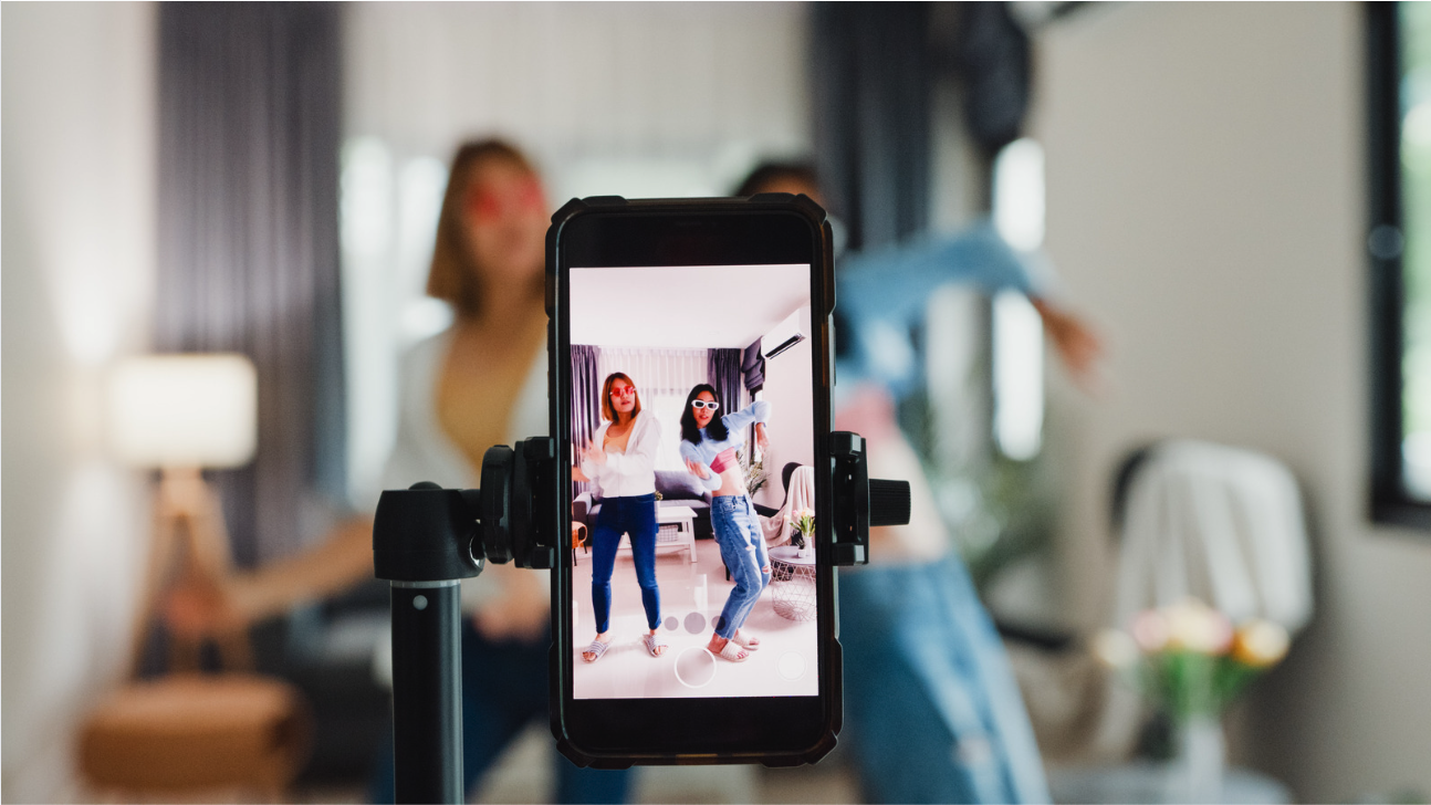 Image showing the benefits of dubbing TikTok content into Arabic to reach and monetize the Arab audience, featuring TikTok logos and Arabic cultural elements."